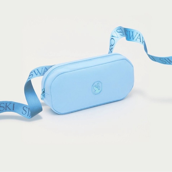 Swarovski Handbags - Swarovski Sky Blue cosmetic Bag